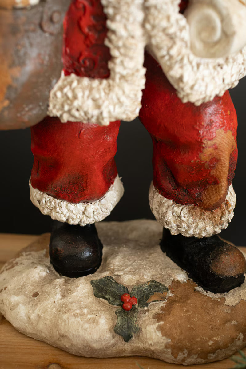 Traditional Santa with List Statue