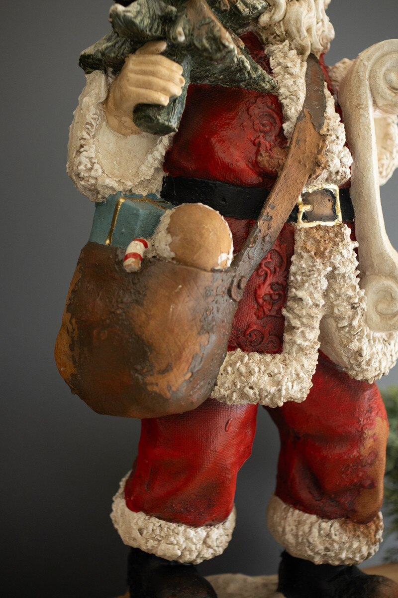Traditional Santa with List Statue